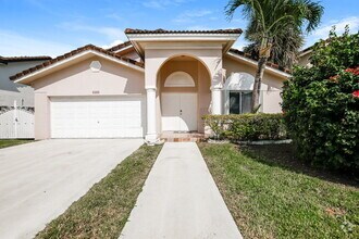 Building Photo - 11657 SW 144th Ave