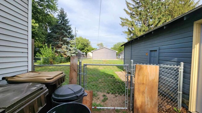 Fenced back yard - 511 14th Ave