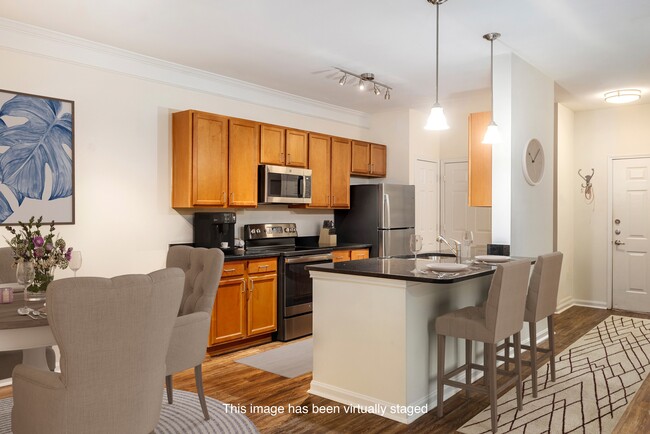 Virtually staged kitchen area - The Grandview at Lake Murray