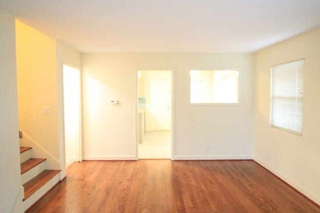 Building Photo - Olathe Duplex w/ Wood Floors, Finished Basement, and a Fenced Yard!