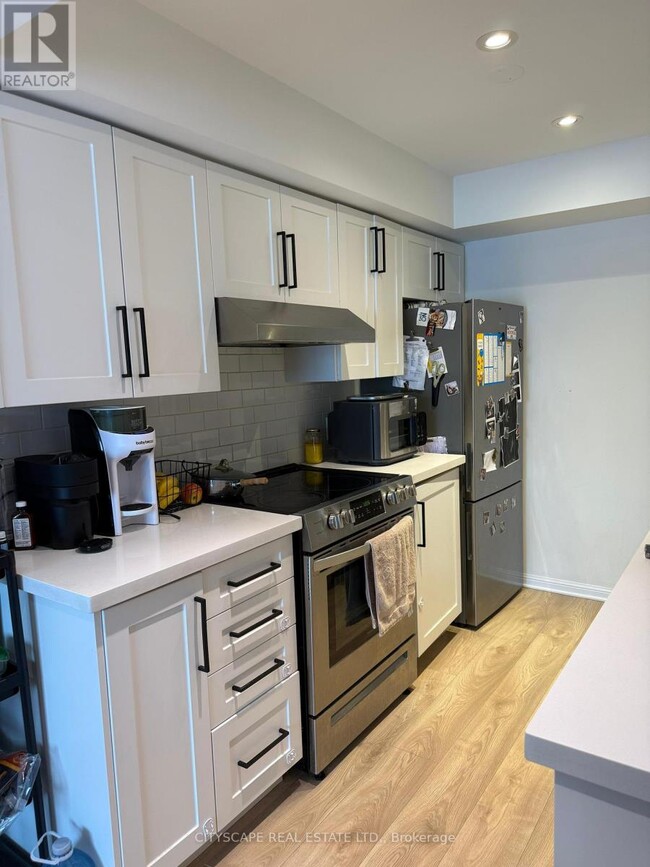 Building Photo - 4620-4620 Guildwood Way
