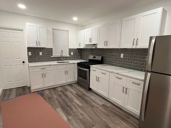 Building Photo - Everything is new and MOVE IN ready