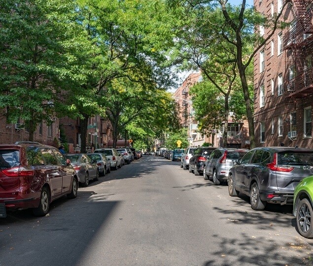 A shady residential street in Elmhurst