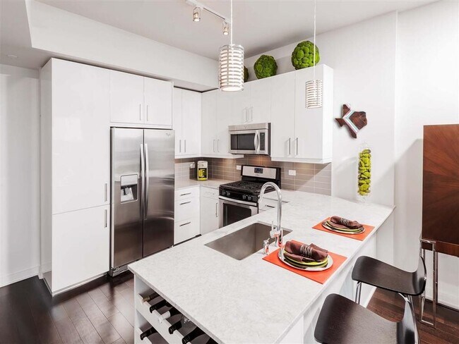 Building Photo - One Bedroom With Striking Quality Included