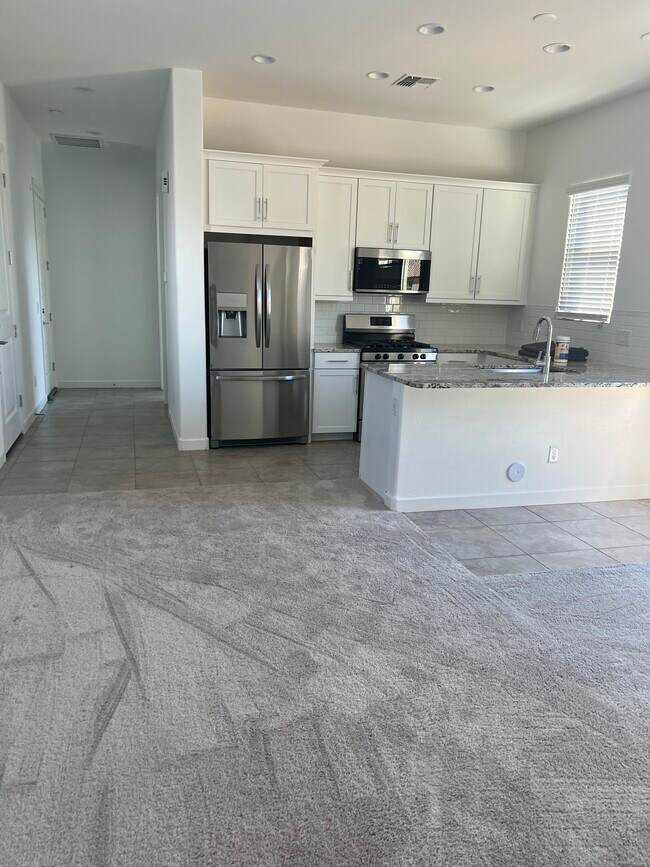 Kitchen/living rm - 3203 N 197th Ln