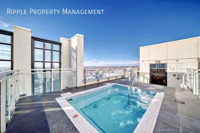 Photo du bâtiment - FIRST MONTH FREE! AMAZING 1 BED+DEN/ 1 BAT...