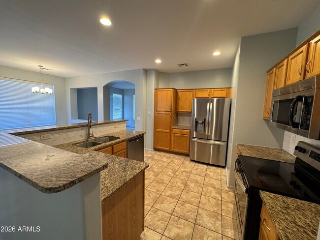 Building Photo - 11562 W La Reata Ave