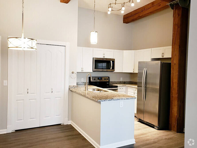 Granite Countertops and High Ceilings - Grand Ledge Apartments