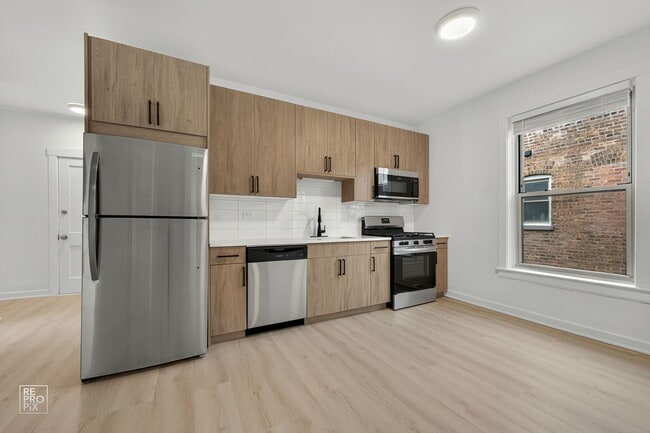 Foto del edificio - 6975 N Bell Ave