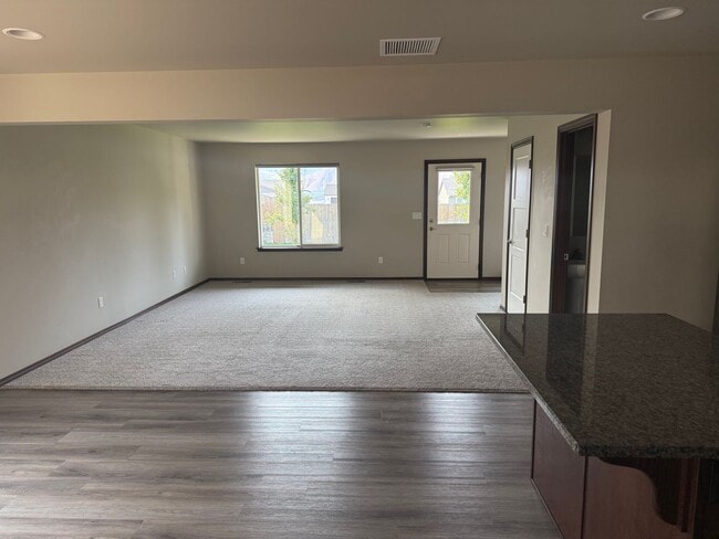 Building Photo - 3 Bedroom. 2.5 Bath House. Fenced Yard w/ ...