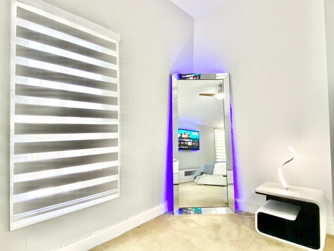 Reflect your best self in our full-size mirror, featuring mood-setting backlit LED lighting. - 505 SW 5th Ave