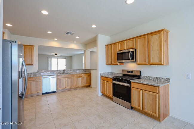 Building Photo - 7106 W Hedge Hog Pl