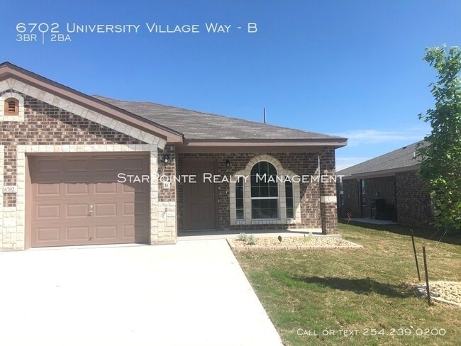Building Photo - 6702 University Village Way Apt. B