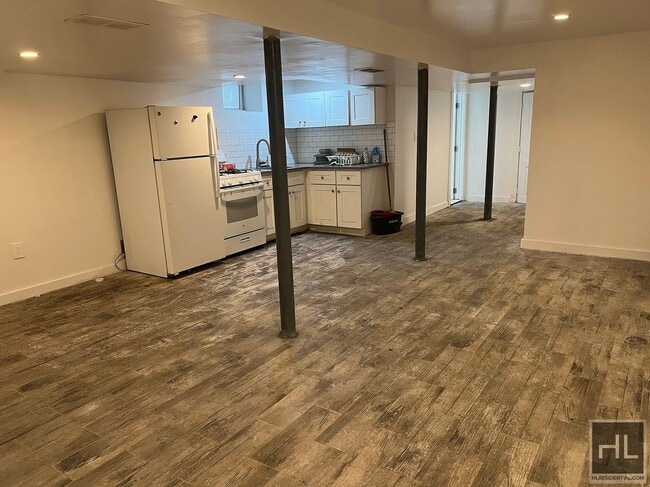 Building Photo - 2BR 1BA Lower Level All Utilities Included w/ Laundry Beside Highland Park