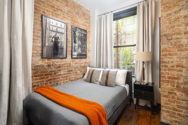 The bedroom features a premium quality mattress - 509 E 87th Street