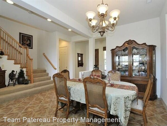 Building Photo - 4 br, 3.5 bath House - 7012 Eagle Ridge Dr