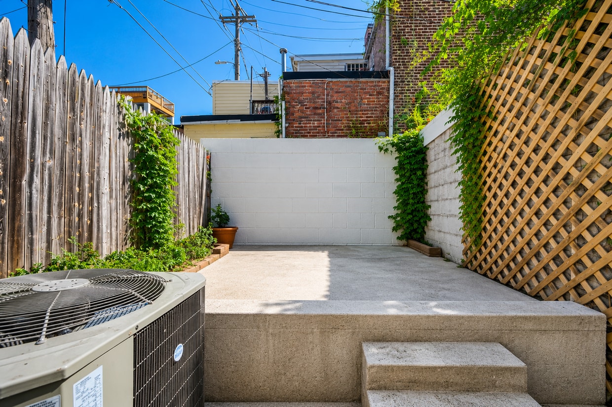 Building Photo - Charming Baltimore Rowhome with Exposed Brick & Private Patio
