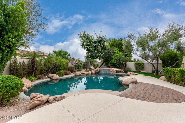 Building Photo - 8317 E Feathersong Ln
