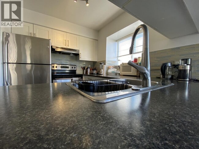 Photo du bâtiment - 1575-1575 W 12th Ave