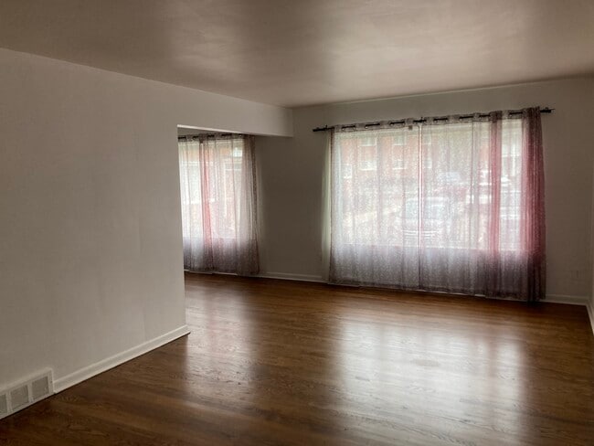 Large windows off dinning room and living room - 335 N Eton St