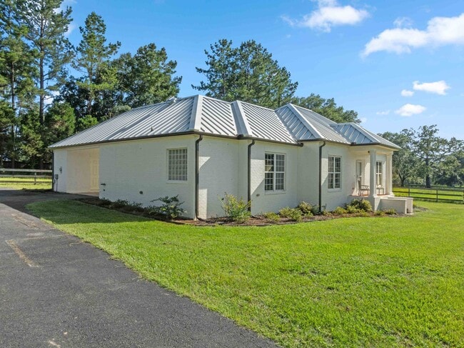 Building Photo - 9525 Woodland Hills Way