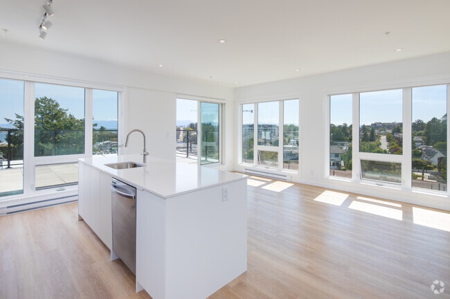 2BR, 2BA - 893SF - Kitchen and Living Room - Adelaide Apartments