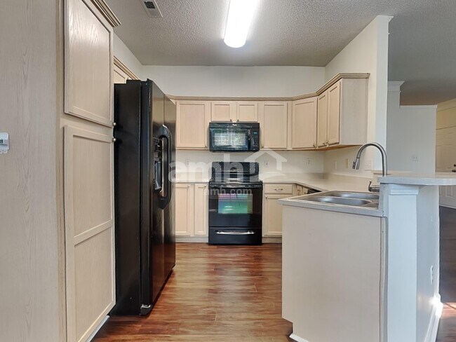 Foto del edificio - 6043 Shining Oak Ln