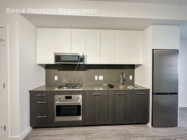 Photo du bâtiment - AMAZING 1 BED/ 1 BATH CONDO