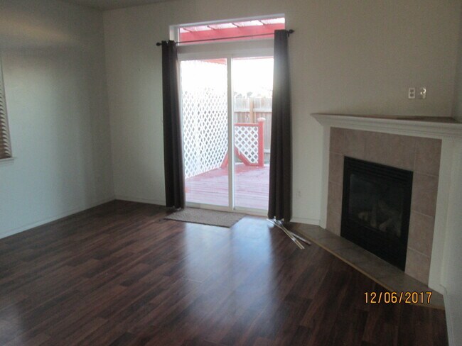 living room + gas fireplace - 12612 W 4th Ave