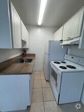 Building Photo - 3871 SW 12th Pl