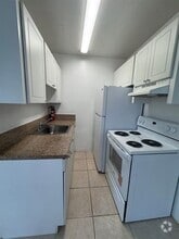 Building Photo - 3871 SW 12th Pl