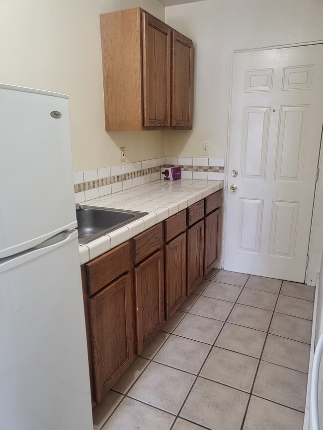 kitchen with back door to parking - 451 16th St SE