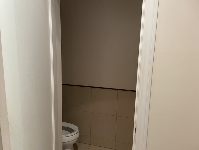 Half bath located to the right of the entry way - 2577 Bryant St