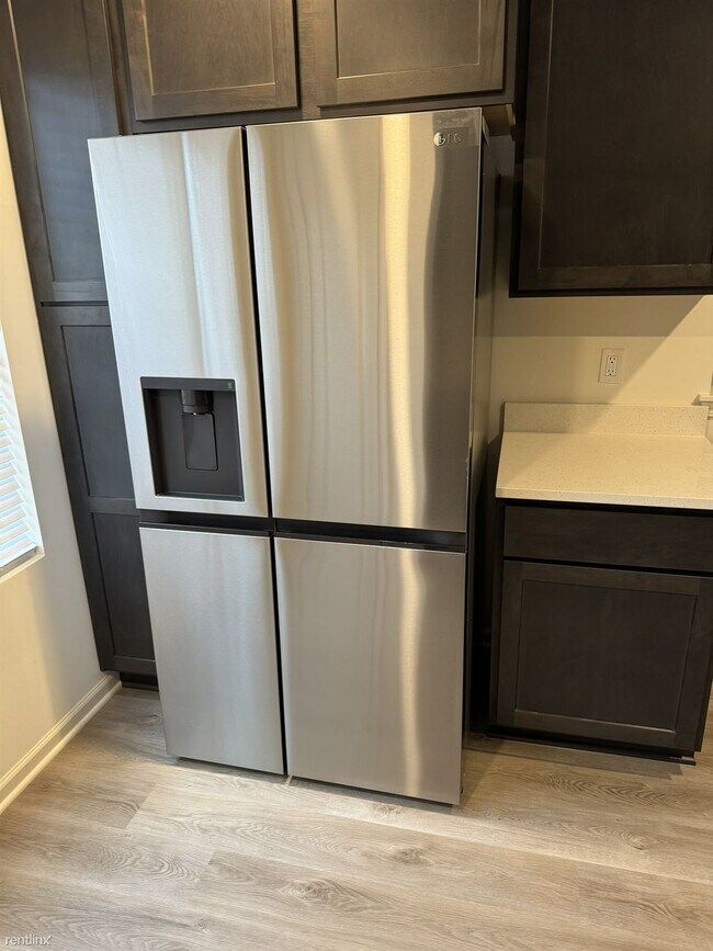 Building Photo - 3 br, 2.5 bath Townhome - 8693 Orchid Drive