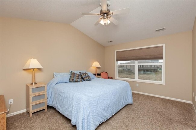 Master bedroom with large walk-in closet and full bathroom with dual vanity - 407 NE 46th St