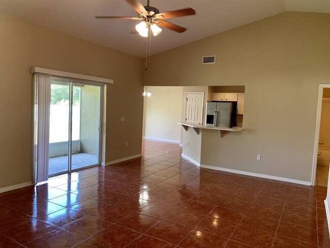 Building Photo - Lovely 4/2 with covered lanai & large yard