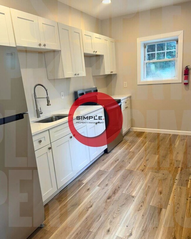 Foto del edificio - Two-bedroom one bath house with off street...