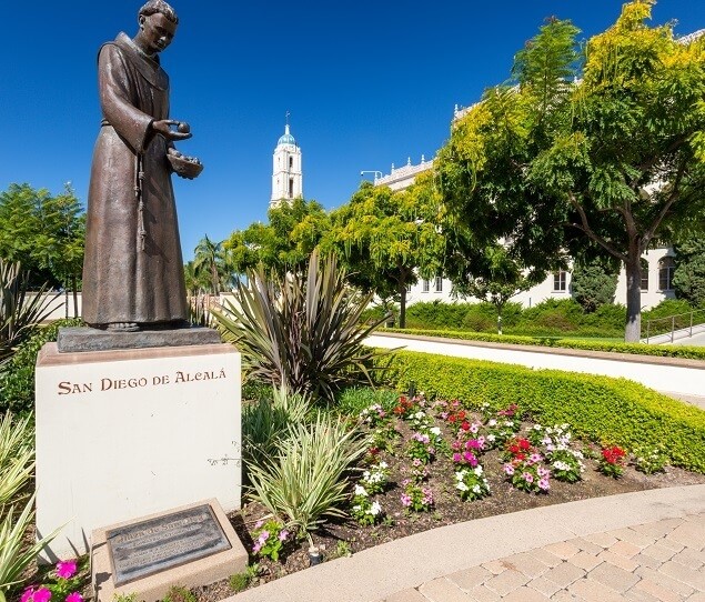 The statue of San Diego de Alcala is located in the Plaza de San Diego