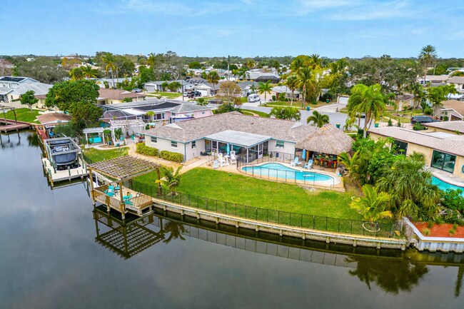 Building Photo - Waterfront Tiki Paradise with Pool and Boat Lift