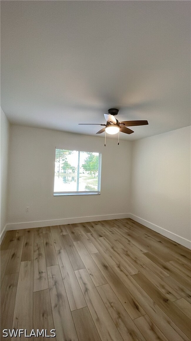 Building Photo - 8234 Key Royal Cir