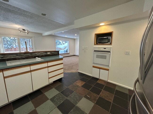 Building Photo - Century 21 Gold Rush - 3 Bed | 2 Bath | 2-Car Garage | End-Unit Condo (FAIRBANKS)