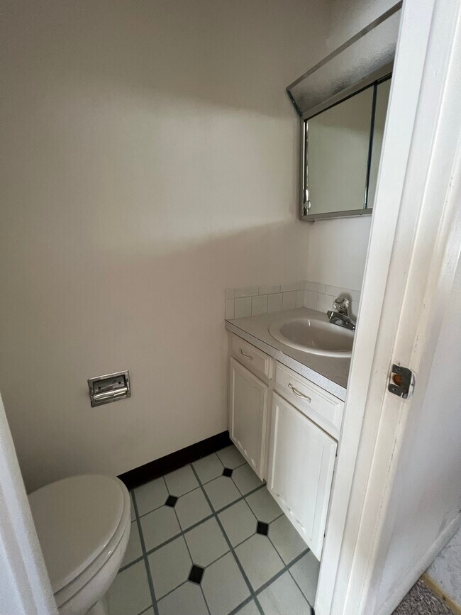 upstairs half bath - 1424 Kay St