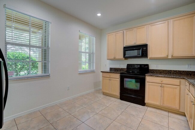 Building Photo - 158 W Thatch Palm Cir