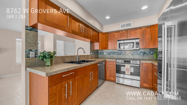 Building Photo - 8762 W Grovers Ave