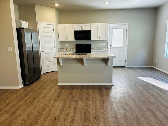 Building Photo - 6821 Devotion Ave