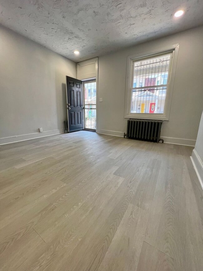 Building Photo - PHA Accepted! Newly Renovated Townhome in ...