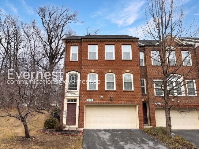 Photo - Spacious Living with Fireplace, Deck & Garage / 3 Bed & 4 Bath / Available Now! Townhome