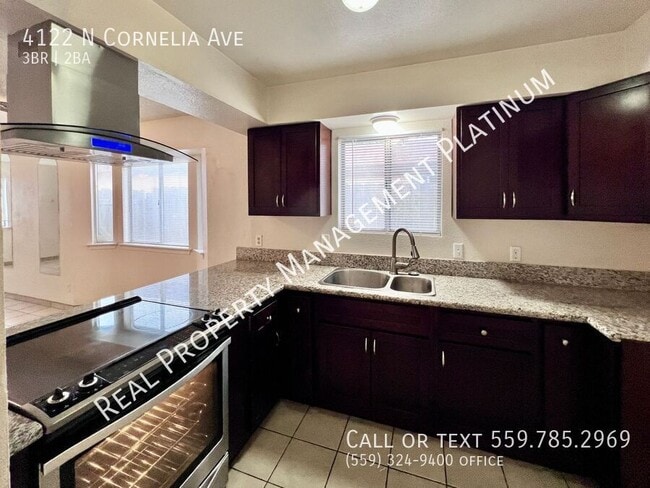 Building Photo - 4122 N Cornelia Ave