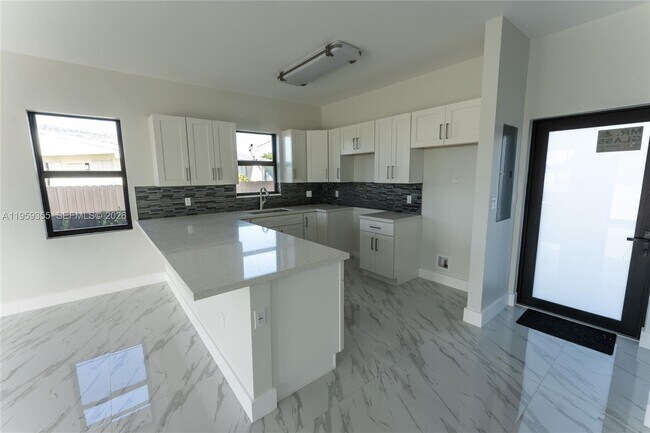 Foto del edificio - 22385 SW 115th Ct