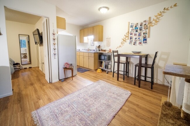 Open concept living/dining spaces give you the ability to set your space how you like! - Circa Properties